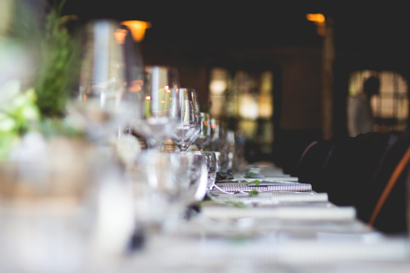 wedding centerpiece decoration - focused photo of wine glasses lined on table